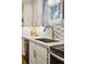 Close up of the kitchen counters and sink at 8736 W 46Th Ave, Wheat Ridge, CO 80033