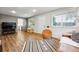 Spacious living room with vinyl floors and lots of natural light at 8736 W 46Th Ave, Wheat Ridge, CO 80033