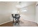 This is a simple office space that includes a desk, computer and chair at 8736 W 46Th Ave, Wheat Ridge, CO 80033