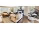 Stylish living room showcasing a fireplace and comfortable seating arrangement creating a cozy ambiance for relaxing at 1000 N Monaco Pkwy, Denver, CO 80220