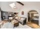 Stylish living room features wood floors, an arched entryway, and a modern color palette at 1000 N Monaco Pkwy, Denver, CO 80220