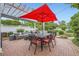 Outdoor patio with a covered pergola, a dining area, and outdoor furniture at 1000 N Monaco Pkwy, Denver, CO 80220