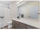 Bathroom with modern vanity, sink, toilet, and a shower-tub combination at 8475 E 36Th Ave # 131, Denver, CO 80238