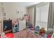 Bright ' bedroom with lots of natural light, and carpet flooring at 8475 E 36Th Ave # 131, Denver, CO 80238