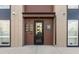 Apartment complex featuring visible unit numbers, modern architecture, and easy access entrance at 8475 E 36Th Ave # 131, Denver, CO 80238