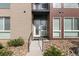 Inviting exterior featuring a modern design, brick accents, stone landscaping, and a well-maintained entrance at 8475 E 36Th Ave # 131, Denver, CO 80238
