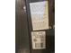 A close up of the air conditioner label including details on the model, serial number, and manufacturer at 3540 Niagara St, Denver, CO 80207
