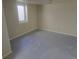 Bright room featuring a window letting in plenty of natural light and neutral walls at 3540 Niagara St, Denver, CO 80207