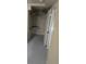 Functional walk-in closet featuring open shelving, ample storage, and a clean design at 3540 Niagara St, Denver, CO 80207