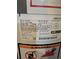 Water heater label including model number, serial number, manufacturer, and certifications at 3540 Niagara St, Denver, CO 80207