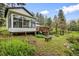 The house features a sun room, plus a deck to soak in the natural beauty at 5071 Parmalee Gulch Rd, Indian Hills, CO 80454