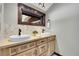 Stylish bathroom featuring double sink vanity, mosaic tile, and modern fixtures at 9123 Booker Ln, Conifer, CO 80433