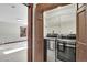 Washer and dryer located off bedroom and next to view window at 9123 Booker Ln, Conifer, CO 80433