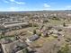 An aerial view of a residential neighborhood with a home that has mountain views at 9950 W 17Th Ave, Lakewood, CO 80215