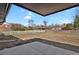 Unfinished backyard displaying the home's lot lines and white picket fence at 9950 W 17Th Ave, Lakewood, CO 80215