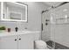 Sleek bathroom featuring modern fixtures, glass-enclosed shower, and stylish vanity at 9950 W 17Th Ave, Lakewood, CO 80215