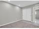 Bedroom with carpet, neutral paint, and double closets at 9950 W 17Th Ave, Lakewood, CO 80215