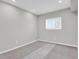 Neutral bedroom with carpet and window at 9950 W 17Th Ave, Lakewood, CO 80215