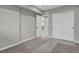 Bedroom with closet and hallway access at 9950 W 17Th Ave, Lakewood, CO 80215