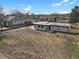 This is a modern home with a flat roof design on a large lot at 9950 W 17Th Ave, Lakewood, CO 80215
