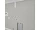 Laundry room setup with connections for a washer and dryer at 9950 W 17Th Ave, Lakewood, CO 80215