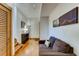 Living room with a comfortable sofa and stairs leading to another level at 1465 S Pearl St # 6, Denver, CO 80210