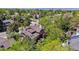 Expansive aerial shot showcases the property, mature trees, outdoor living, and neighborhood at 5373 E Links Cir, Centennial, CO 80122
