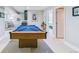 Finished basement with a pool table offering recreational opportunities for entertaining at 5373 E Links Cir, Centennial, CO 80122