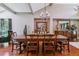 Elegant dining room with hardwood floors, stylish chandelier, and classic decor, perfect for formal entertaining at 5373 E Links Cir, Centennial, CO 80122