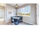 Charming breakfast nook with cozy bench seating, pendant lighting and bright window views at 41402 Country Rose Cir, Parker, CO 80138