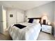 Comfortable bedroom with large closet, ample natural light, and neutral colored walls and carpet at 6561 Ocaso Dr, Castle Pines, CO 80108