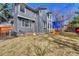 Well-maintained home with a large backyard, play set, and patio area for outdoor entertaining at 19346 E Prentice Ln, Centennial, CO 80015