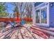 Outdoor space featuring patio with chairs, table, and a fenced yard at 19346 E Prentice Ln, Centennial, CO 80015