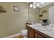 Charming powder room with stylish fixtures and decor at 19346 E Prentice Ln, Centennial, CO 80015