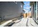 Backyard featuring a stone patio, landscaping and a fence at 6940 Clay St, Denver, CO 80221