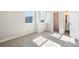 Bright bedroom with carpet, natural light, and ensuite bathroom featuring modern design at 6940 Clay St, Denver, CO 80221