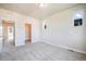 Bright bedroom with carpet, natural light, and access to a walk-in closet at 6940 Clay St, Denver, CO 80221