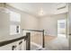 Bright hallway with natural light from windows, showcasing the home's inviting interior at 6940 Clay St, Denver, CO 80221