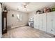 Bright bedroom with wood floors, closet, and built-in storage at 8007 S Dover St, Littleton, CO 80128