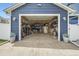 Spacious garage with ample storage and shelving, perfect for organization at 8007 S Dover St, Littleton, CO 80128