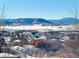 Community view with mountain backdrop and houses at 359 Castlemaine Ct, Castle Rock, CO 80104