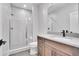 Modern bathroom with a glass shower and a wood vanity at 359 Castlemaine Ct, Castle Rock, CO 80104