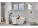 Relaxing bathroom featuring a freestanding soaking tub and a large walk-in shower at 359 Castlemaine Ct, Castle Rock, CO 80104