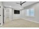 Spacious bedroom with carpet, ceiling fan, and large window at 359 Castlemaine Ct, Castle Rock, CO 80104