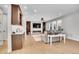 Modern living room featuring a fireplace, built-ins, and hardwood floors at 359 Castlemaine Ct, Castle Rock, CO 80104