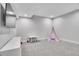 Finished basement playroom with a teepee and small table at 359 Castlemaine Ct, Castle Rock, CO 80104