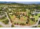 Aerial view of property outlining the lot lines and the house with a deck at 21868 Mountsfield Dr, Golden, CO 80401