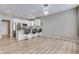 Modern kitchen with stainless steel appliances and breakfast bar at 23802 E 2Nd Dr, Aurora, CO 80018