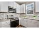 Well-equipped kitchen with stainless steel appliances at 23802 E 2Nd Dr, Aurora, CO 80018