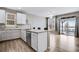 Modern kitchen with white cabinets and granite countertops at 23802 E 2Nd Dr, Aurora, CO 80018